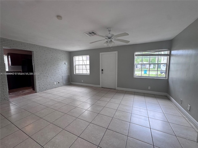 423 SW 10th Ave, Boynton Beach, FL 33435 - entrance foyer featuring light tile patterned floors and ceiling fan