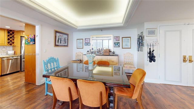 11113 Biscayne Blvd Unit 1055, Miami, FL 33181 - dining room featuring wood finished floors, a raised ceiling, and recessed lighting