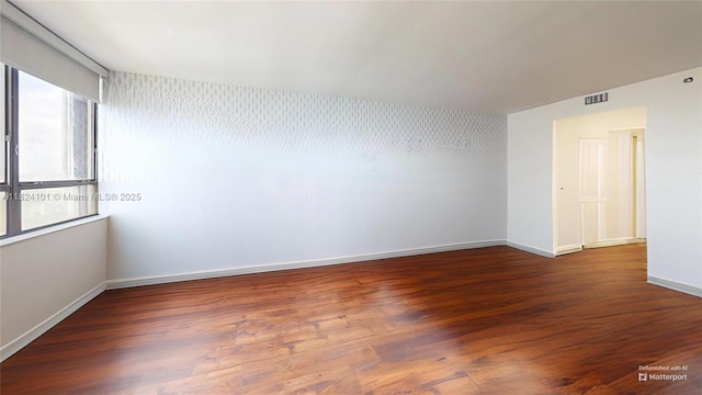 11113 Biscayne Blvd Unit 1055, Miami, FL 33181 - empty room featuring wood finished floors