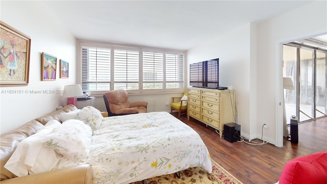11113 Biscayne Blvd Unit 1055, Miami, FL 33181 - bedroom featuring dark wood-type flooring and baseboards