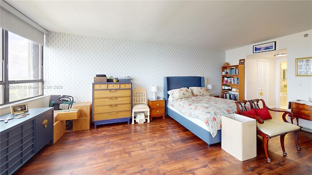 11113 Biscayne Blvd Unit 1055, Miami, FL 33181 - bedroom with wallpapered walls and wood finished floors