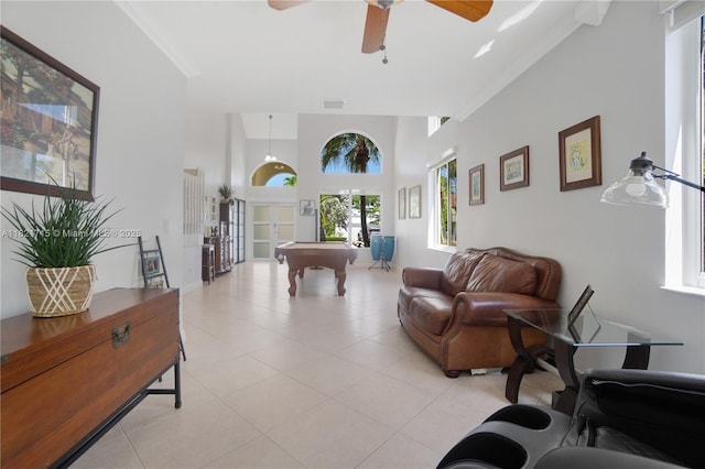 801 NW 156th Ave, Pembroke Pines, FL 33028 - living area with billiards table, ceiling fan, light tile patterned floors, a towering ceiling, and french doors