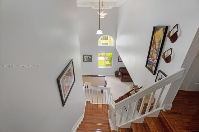 801 NW 156th Ave, Pembroke Pines, FL 33028 - stairs featuring a textured ceiling, a high ceiling, and tile patterned floors