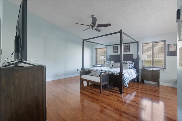 801 NW 156th Ave, Pembroke Pines, FL 33028 - bedroom with wood finished floors, a textured ceiling, and ceiling fan