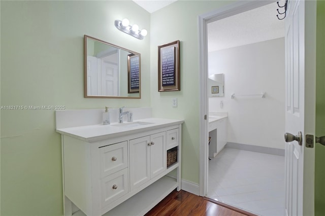 801 NW 156th Ave, Pembroke Pines, FL 33028 - bathroom featuring vanity and wood finished floors