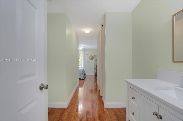 801 NW 156th Ave, Pembroke Pines, FL 33028 - hall featuring light wood finished floors and baseboards