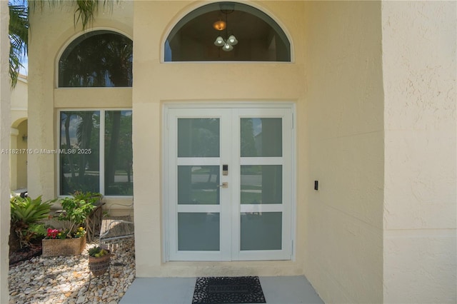 801 NW 156th Ave, Pembroke Pines, FL 33028 - property entrance featuring french doors and stucco siding