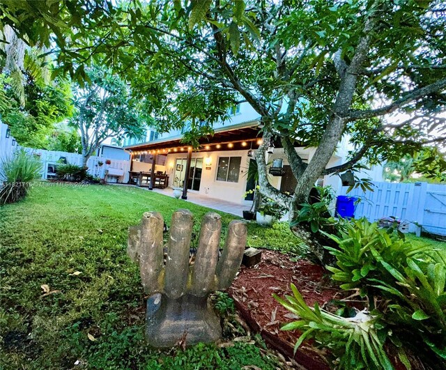 801 NW 156th Ave, Pembroke Pines, FL 33028 - rear view of house with a fenced backyard and a patio