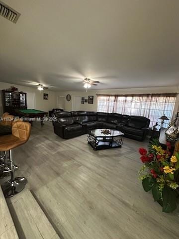 3404 Garden Ln, Miramar, FL 33023 - living room featuring wood finished floors, ceiling fan, and billiards table