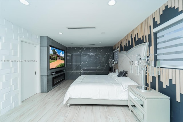 3404 Garden Ln, Miramar, FL 33023 - bedroom with light wood finished floors and recessed lighting