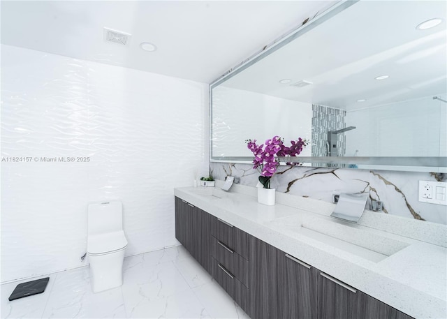 3404 Garden Ln, Miramar, FL 33023 - full bath with double vanity, marble finish flooring, recessed lighting, and a shower