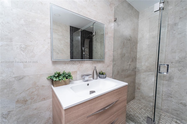 3404 Garden Ln, Miramar, FL 33023 - full bathroom with vanity, tile walls, and a stall shower