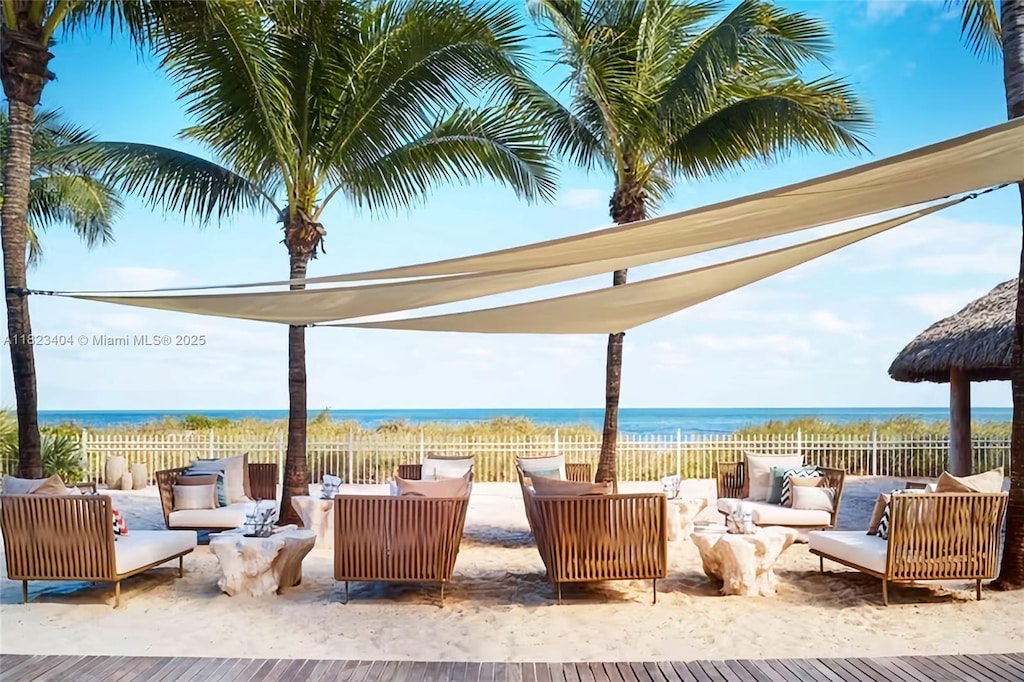 455 Grand Bay Dr Unit 210, Key Biscayne, FL 33149 - view of patio featuring outdoor lounge area and a water view