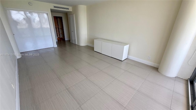 900 Bay Dr Unit 906, Miami Beach, FL 33141 - unfurnished room featuring baseboards