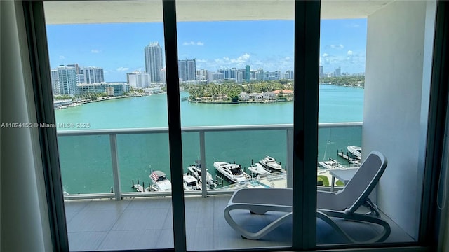 900 Bay Dr Unit 906, Miami Beach, FL 33141 - balcony featuring a skyline view and a water view