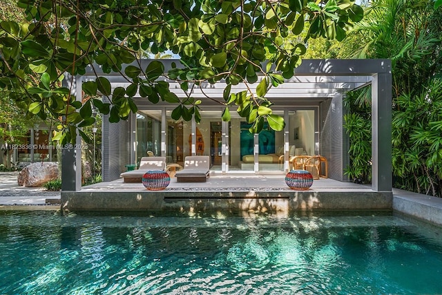 11 La Gorce Cir, Miami Beach, FL 33141 - outdoor pool with an exterior structure and an outbuilding