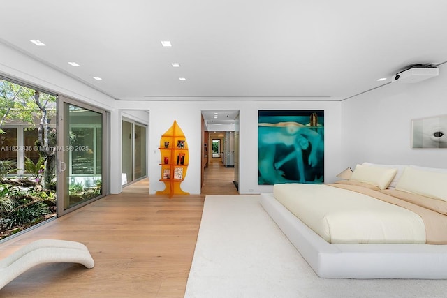 11 La Gorce Cir, Miami Beach, FL 33141 - bedroom with light wood finished floors and recessed lighting