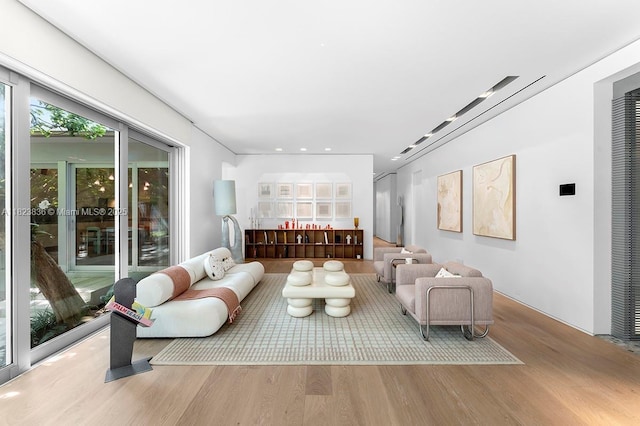 11 La Gorce Cir, Miami Beach, FL 33141 - living room featuring wood finished floors, healthy amount of natural light, and recessed lighting