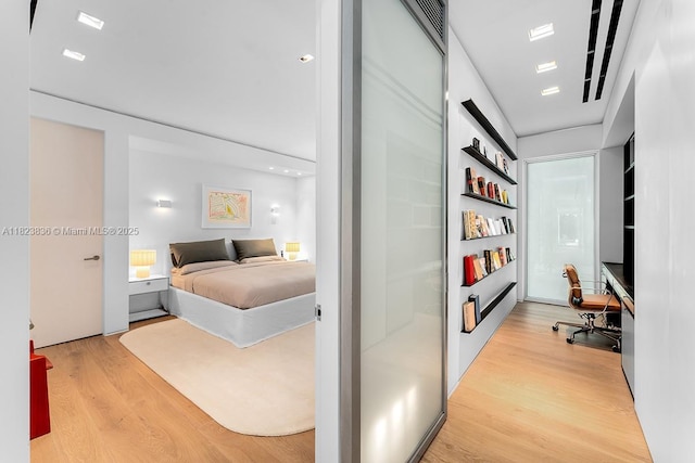 11 La Gorce Cir, Miami Beach, FL 33141 - bedroom with a desk and light wood-style floors