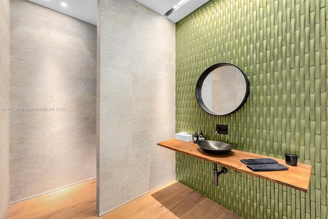 11 La Gorce Cir, Miami Beach, FL 33141 - bathroom featuring wood finished floors and a sink