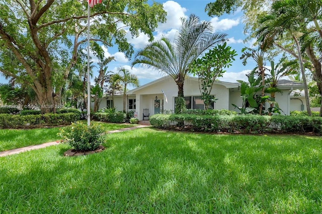 7340 SW 123rd Ter, Pinecrest, FL 33156 - single story home featuring a front lawn and stucco siding