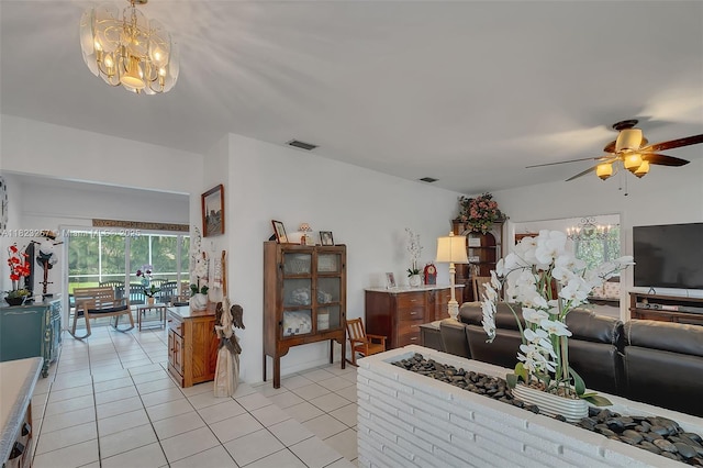 7340 SW 123rd Ter, Pinecrest, FL 33156 - living area with a chandelier, a ceiling fan, and light tile patterned floors