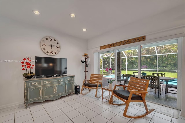 7340 SW 123rd Ter, Pinecrest, FL 33156 - living room featuring recessed lighting, light tile patterned floors, and a sunroom
