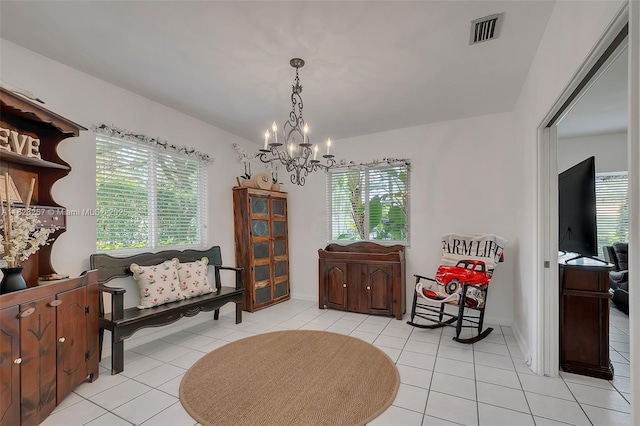 7340 SW 123rd Ter, Pinecrest, FL 33156 - sitting room with a chandelier, light tile patterned flooring, and healthy amount of natural light
