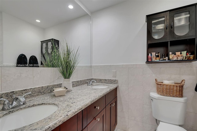 7340 SW 123rd Ter, Pinecrest, FL 33156 - full bathroom with double vanity, recessed lighting, and tile walls