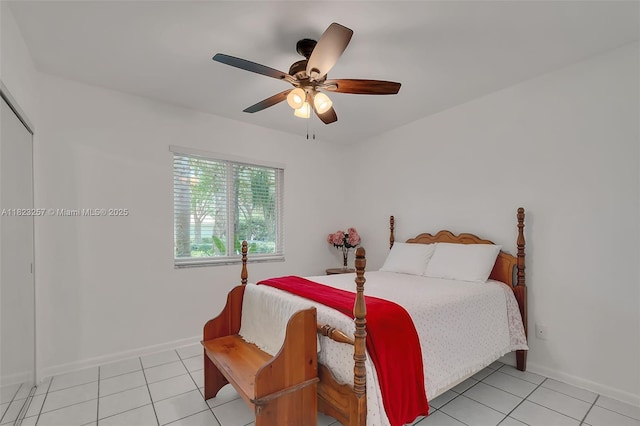 7340 SW 123rd Ter, Pinecrest, FL 33156 - bedroom with light tile patterned floors and ceiling fan