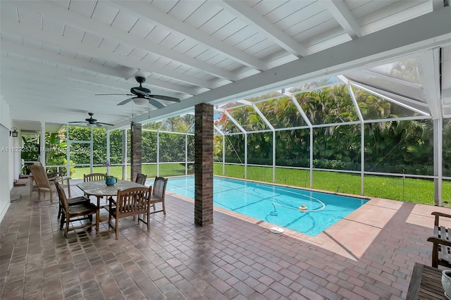 7340 SW 123rd Ter, Pinecrest, FL 33156 - swimming pool featuring ceiling fan, a patio area, a yard, and glass enclosure