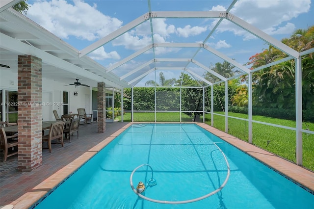 7340 SW 123rd Ter, Pinecrest, FL 33156 - swimming pool featuring ceiling fan, a yard, a patio area, and glass enclosure