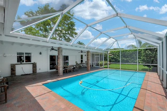 7340 SW 123rd Ter, Pinecrest, FL 33156 - swimming pool featuring ceiling fan, a patio, and glass enclosure