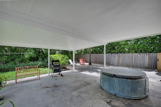 7340 SW 123rd Ter, Pinecrest, FL 33156 - fenced backyard featuring a patio and a hot tub