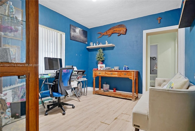 1395 NE 178th St, North Miami Beach, FL 33162 - home office with wood finished floors and a textured ceiling