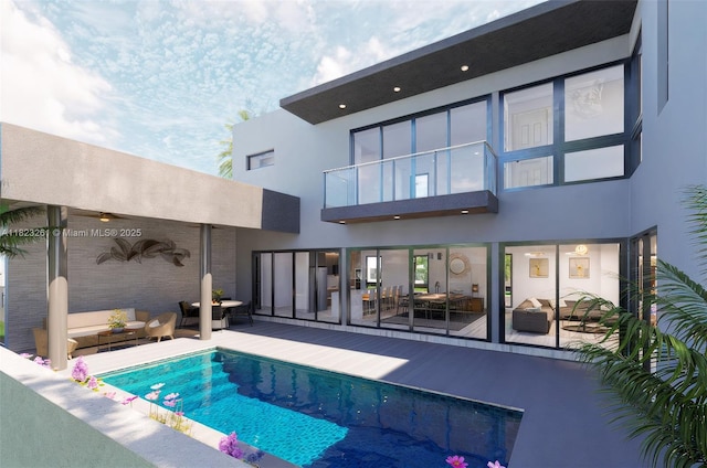 69 NE 50th Ter, Miami, FL 33137 - rear view of house with stucco siding, an outdoor pool, a patio area, and an outdoor living space