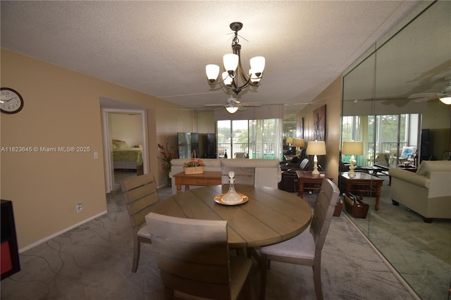100 SW 130th Unit 311C, Pembroke Pines, FL 33027 - dining space featuring ceiling fan, light colored carpet, a chandelier, healthy amount of natural light, and a textured ceiling