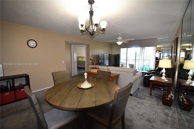 100 SW 130th Unit 311C, Pembroke Pines, FL 33027 - dining room featuring carpet, a chandelier, a ceiling fan, and a textured ceiling
