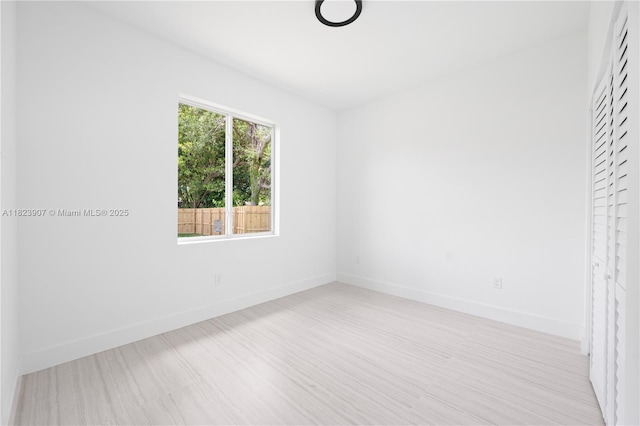 10741 SW 217th St, Miami, FL 33170 - unfurnished bedroom featuring wood finished floors and a closet