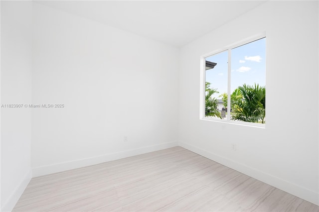 10741 SW 217th St, Miami, FL 33170 - unfurnished room with baseboards and light wood-type flooring