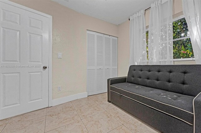 10371 SW 146th St, Miami, FL 33176 - sitting room featuring tile patterned floors and a textured wall