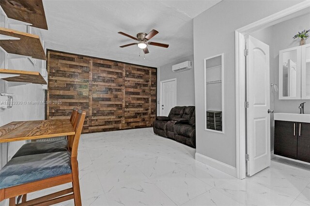 10371 SW 146th St, Miami, FL 33176 - living area with a ceiling fan, a wall unit AC, light marble finish flooring, and wooden walls