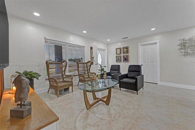 10371 SW 146th St, Miami, FL 33176 - living area featuring a textured wall, recessed lighting, and light tile patterned floors