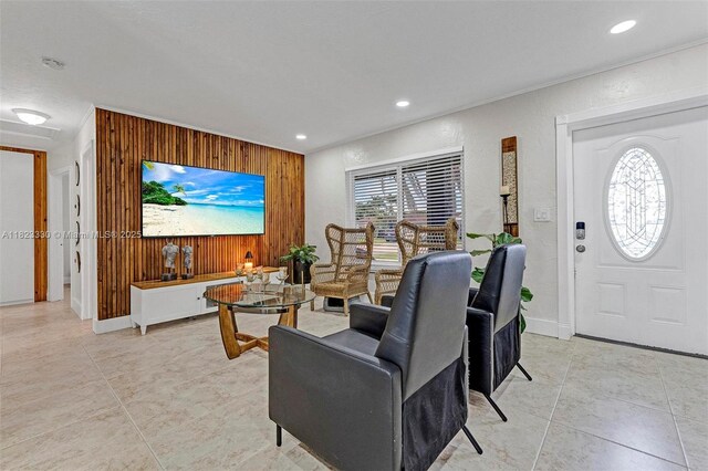 10371 SW 146th St, Miami, FL 33176 - living area featuring wood walls, recessed lighting, light tile patterned floors, and an accent wall