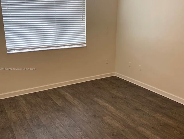1733 Village Blvd Unit 105, West Palm Beach, FL 33409 - empty room featuring dark wood-style flooring