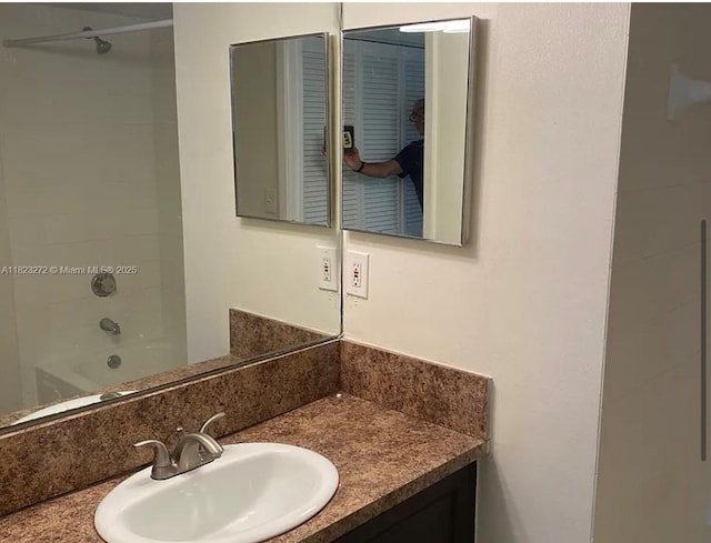 1733 Village Blvd Unit 105, West Palm Beach, FL 33409 - bathroom featuring vanity and shower / washtub combination