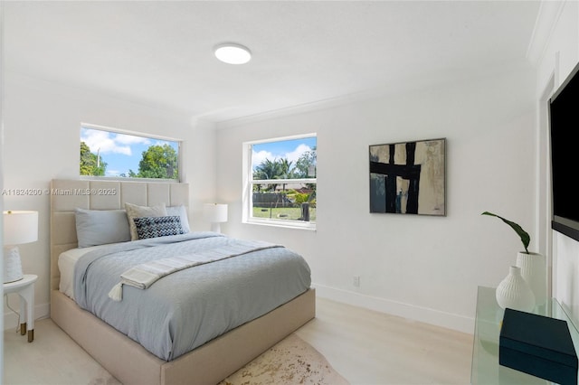 813SW 3rd Ct, Delray Beach, FL 33444 - bedroom featuring baseboards and light wood-style flooring