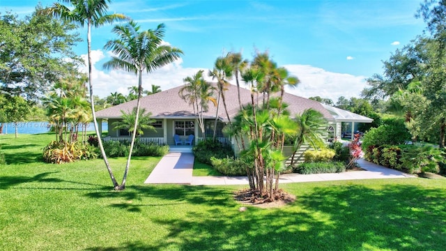 20406 SW 54th Pl, Pembroke Pines, FL 33332 - view of front of property featuring a front lawn and a shingled roof