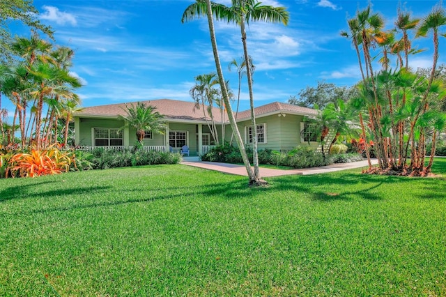 20406 SW 54th Pl, Pembroke Pines, FL 33332 - view of front of property with a front lawn and covered porch