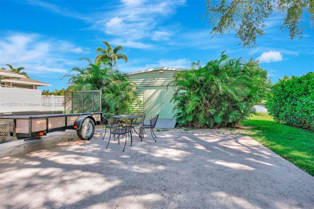 20406 SW 54th Pl, Pembroke Pines, FL 33332 - view of patio / terrace featuring outdoor dining area